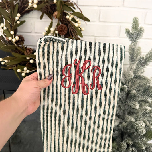 green and natural striped farmhouse stocking with red thread and font 3