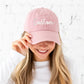 dusty rose baseball hat with custom puff print white embroidered design