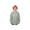 Child wearing a light green sweatshirt with 'St. Pete's Panthers' text on a white background