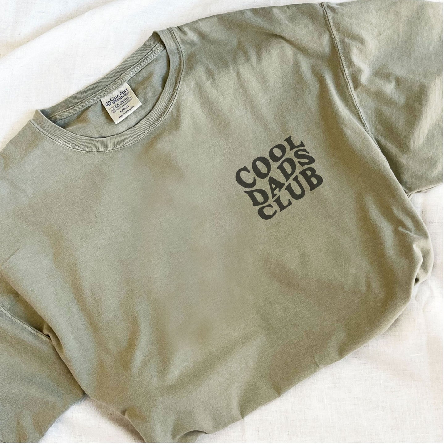 sandstone comfort colors tee with a wavy cool dads club printed design