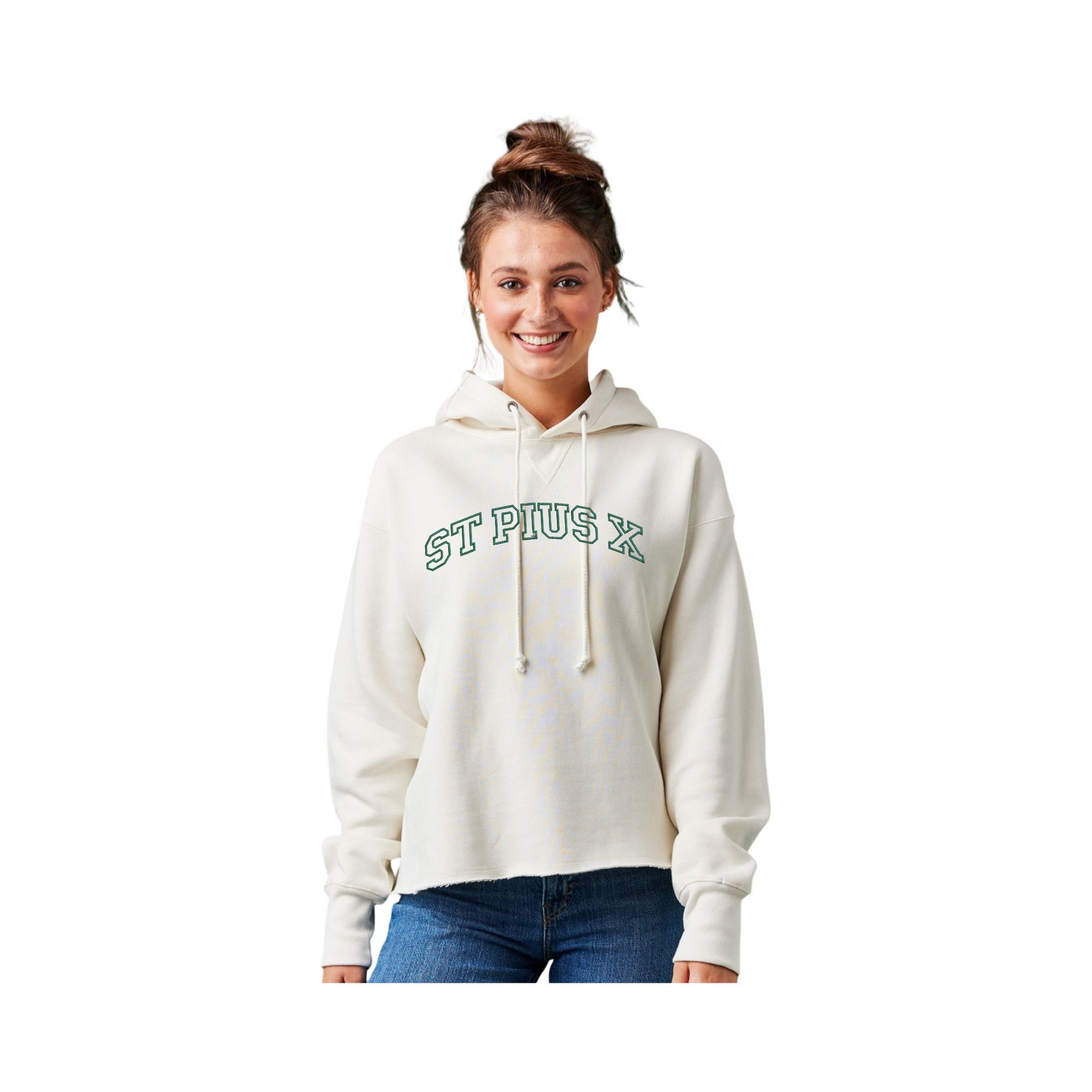 Woman wearing a white hoodie with 'St. Pius X' text on a white background