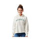 Woman wearing a white hoodie with 'St. Pius X' text on a white background