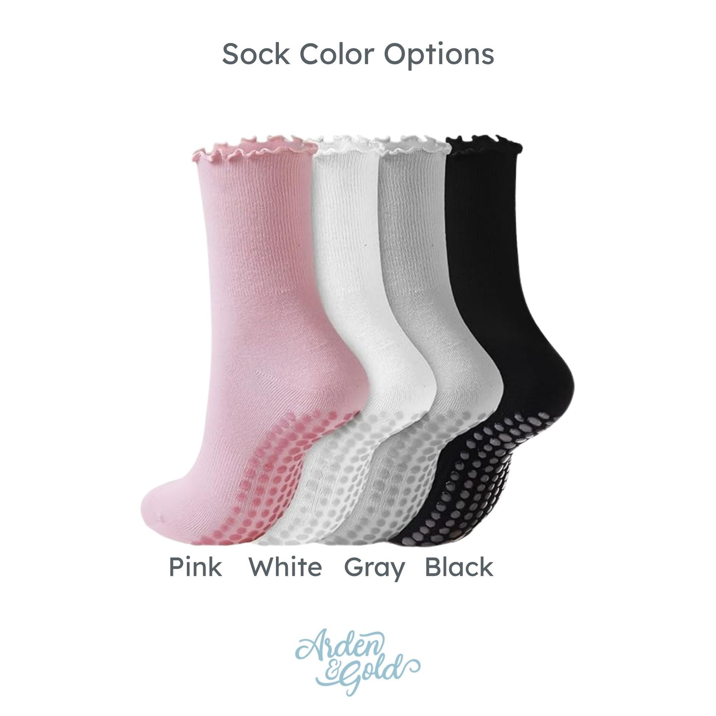 Four pairs of socks in pink, white, gray, and black 