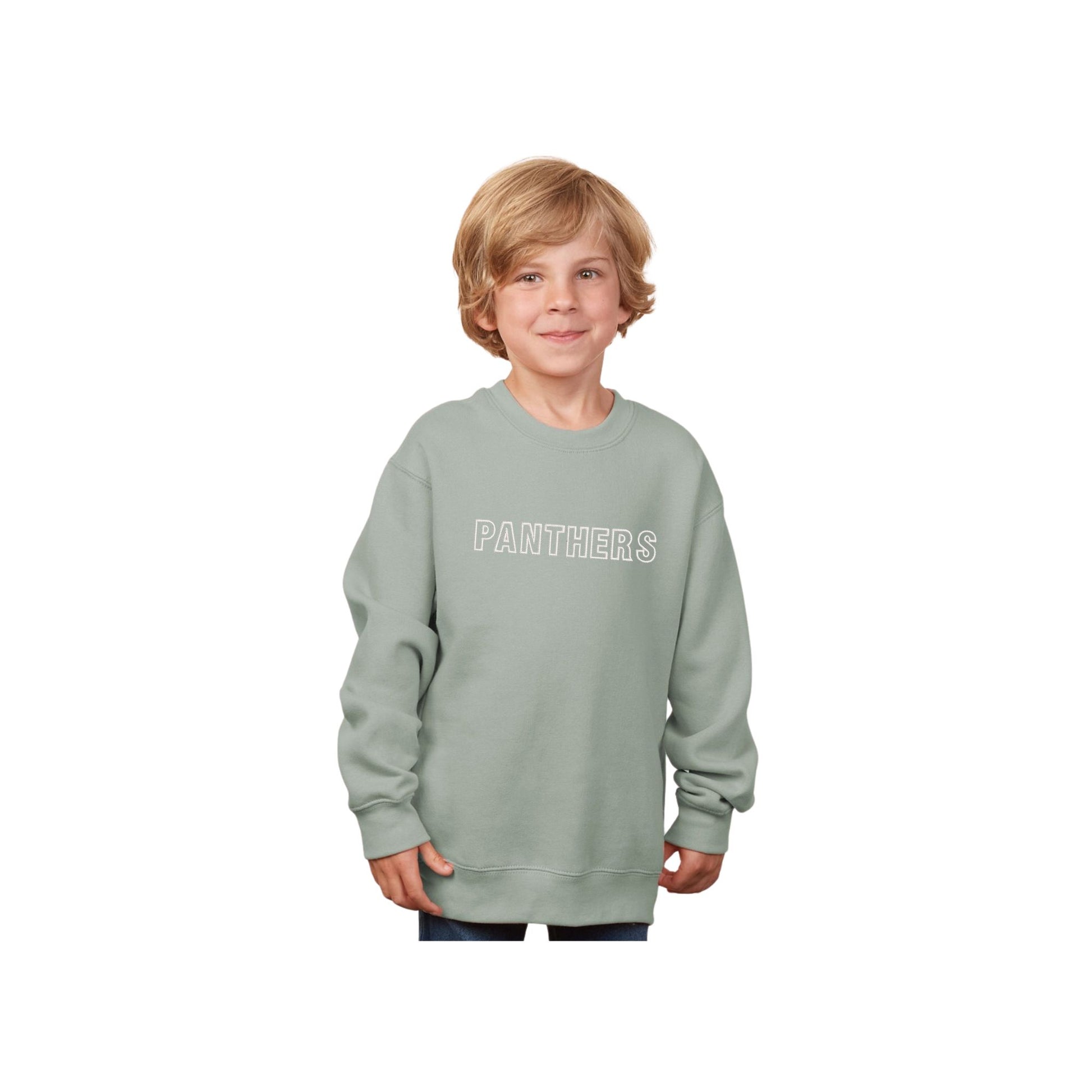 Child wearing a light green sweatshirt with 'PANTHERS' text on a white background