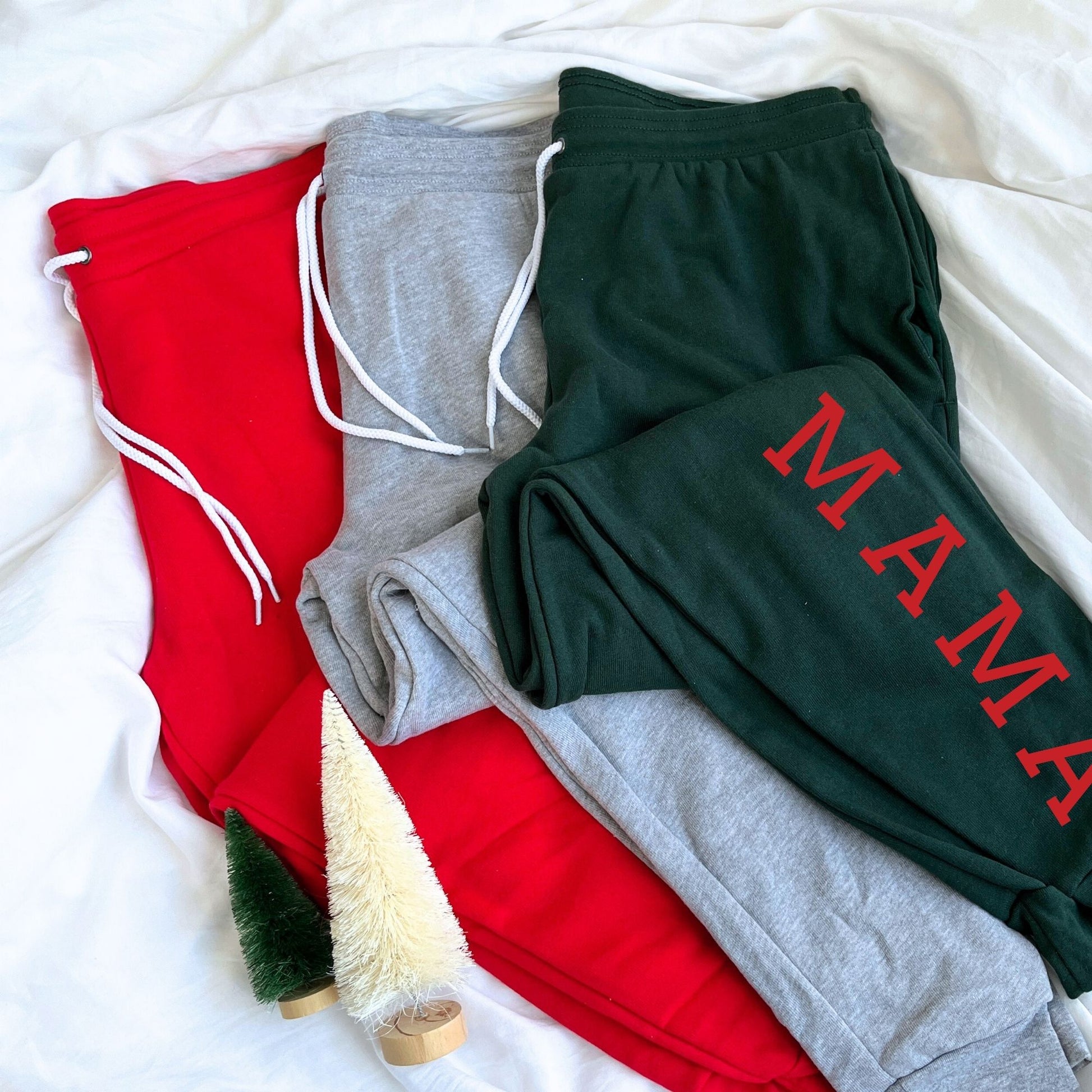 red, athletic heather, and forest bella and canvas joggers with custom mama print along the left leg