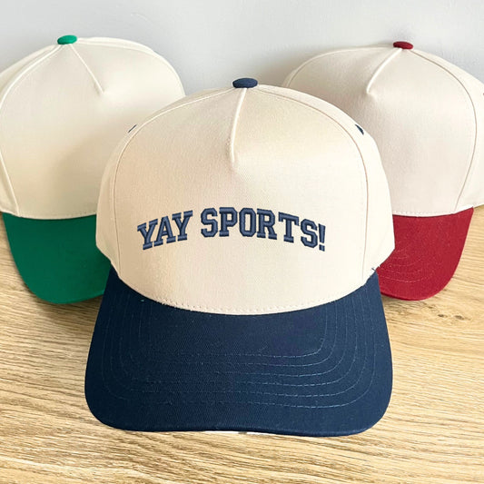 green, burgundy, and navy vintage inspired two-tone trucker hat with custom yay sports embroidered design