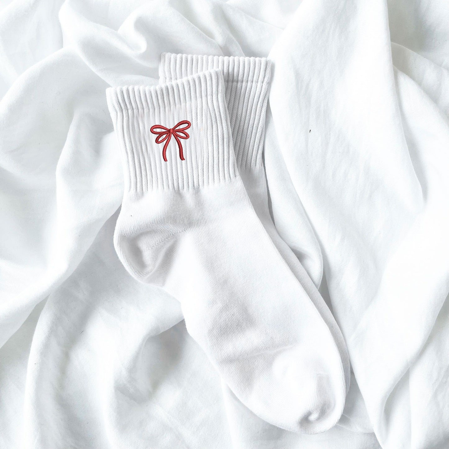 ankle high white socks with embroidered red ribbon bow