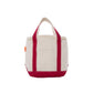 Beige tote cooler bag with red trim on a white background