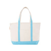 Natural tote bag with baby blue trim on a white background