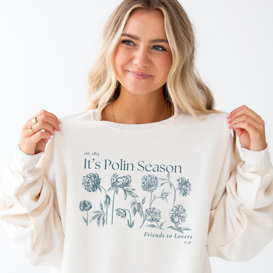 girl wearing an oversized crew with a bridgerton inspired polin season floral printed design