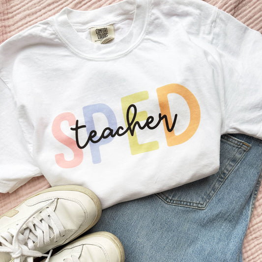 outfit layout including a white comfort colors t-shirt with a SPED teacher printed design on the center chest