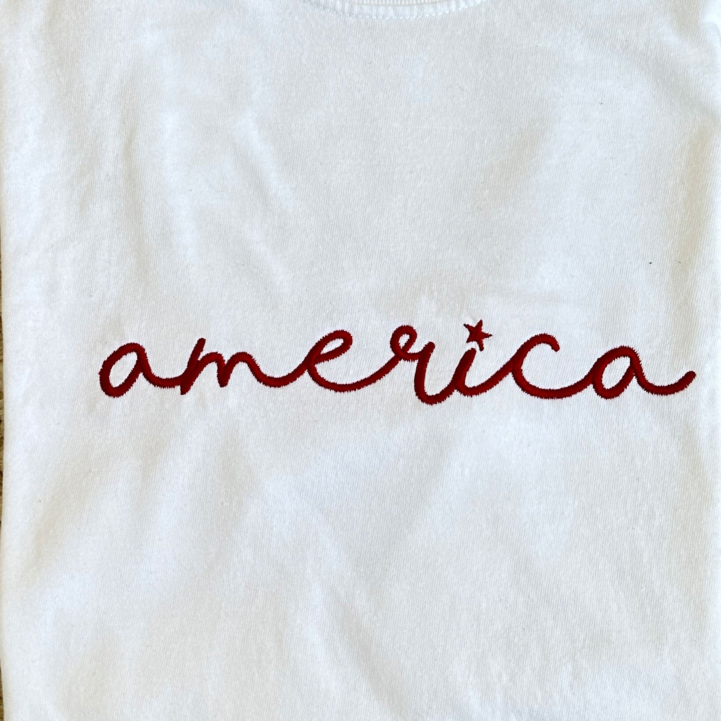 close up of embroidered america design t-shirt