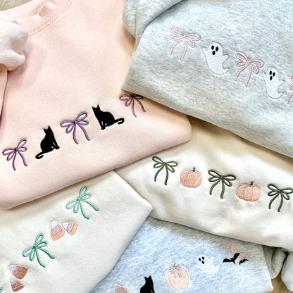 mix of crewneck sweatshirts with cute halloween and bow embroidered icons 