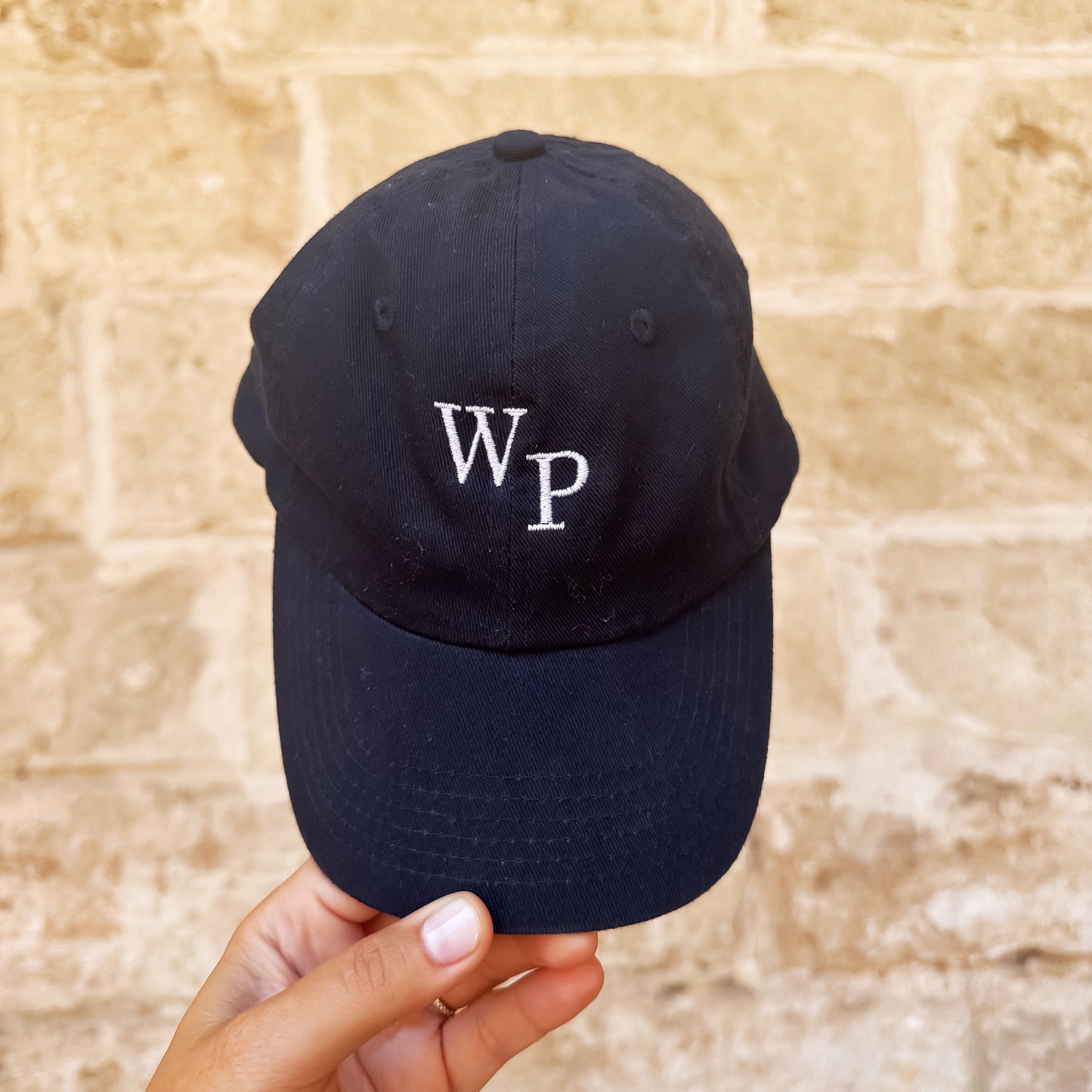 youth navy baseball hat with mini embroidered staggered initial