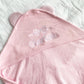 Full name and bow embroidered hooded baby towel on pink with White thread