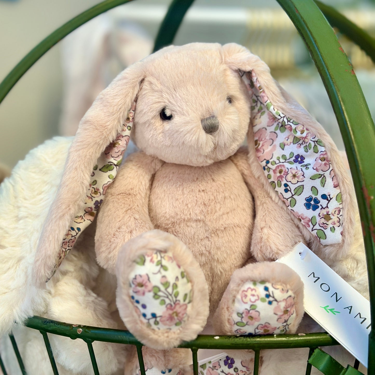 pink stuffed bunny plush with floral fabric feet and ear lining