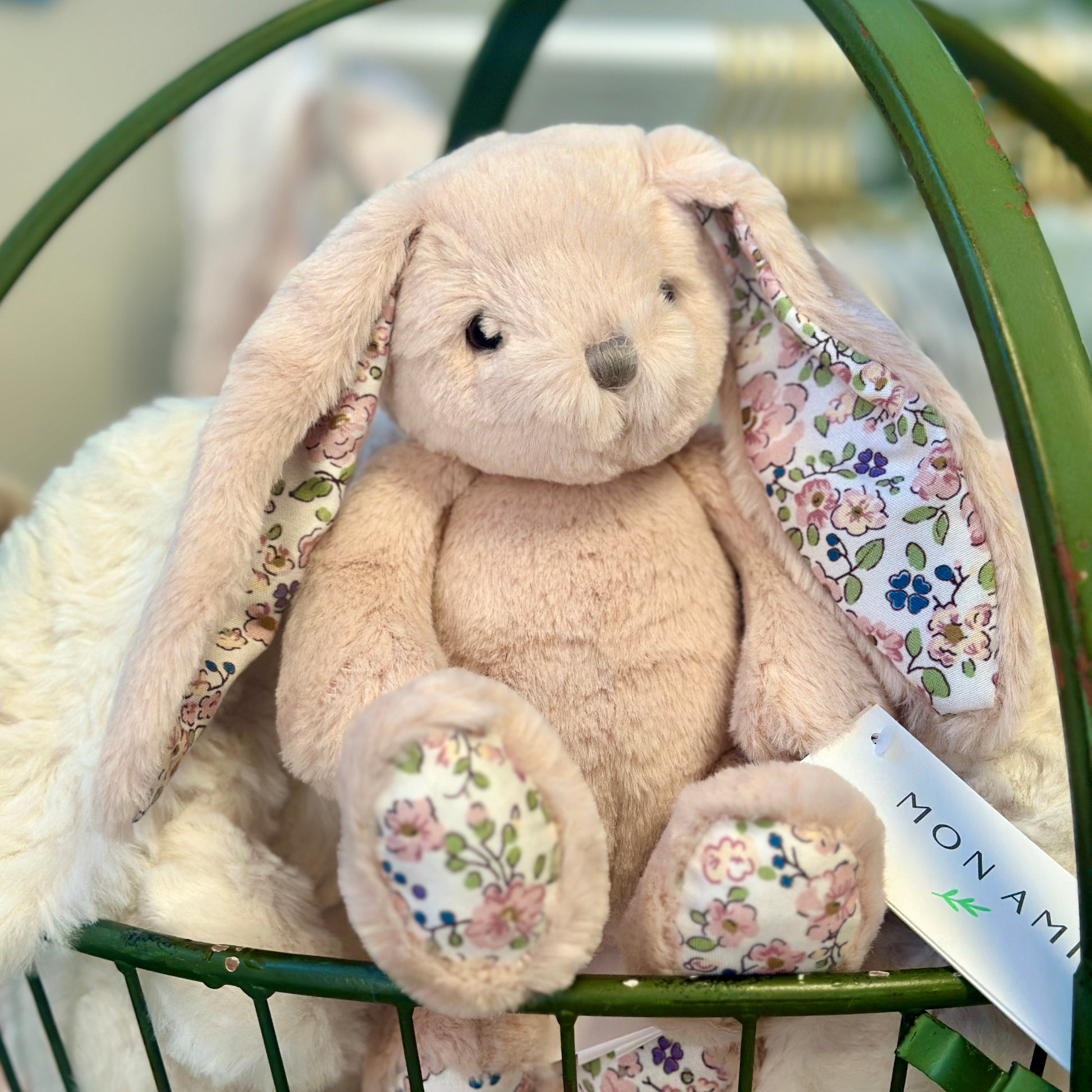 pink stuffed bunny plush with floral fabric feet and ear lining