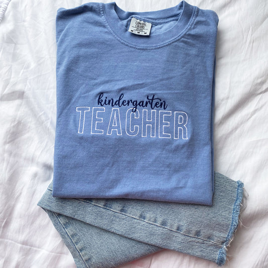 blue comfort colors tee with custom grade level and teacher embroidered design