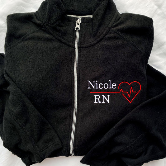 lightweight fleece full zip jacket for a nurse with a personalized name and heart embroidered design