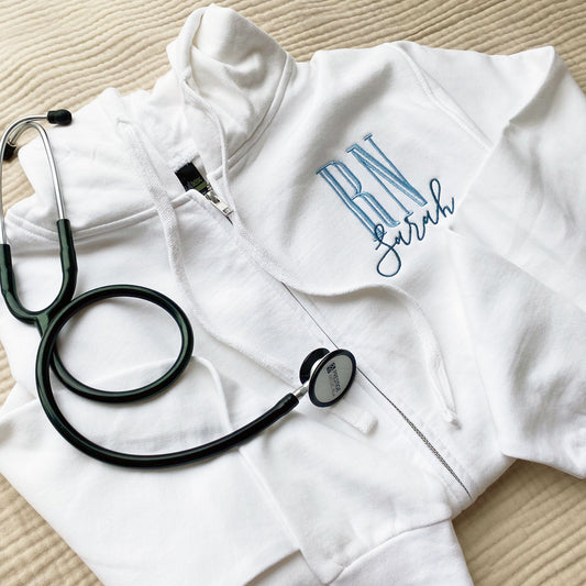 white jacket with custom credential and name embroidered design