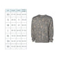 Gray sweatshirt with floral pattern next to a size chart on a white background