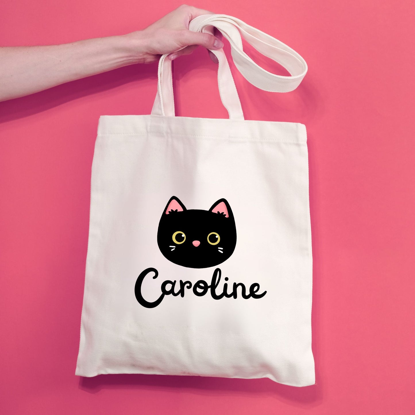 natural canvas trick or treat tote bag with custom black cat and name printed design