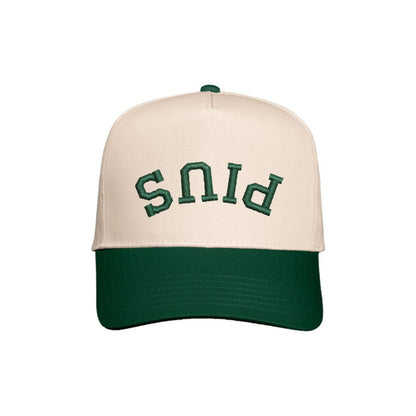Beige and green cap with 'PIUS' text on a white background