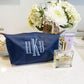 navy nylon makeup pouch with hkb monogram embroidered in baby blue thread