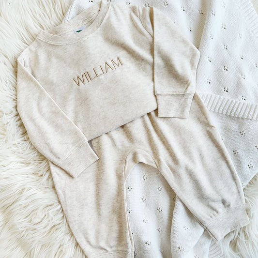 infant jogger set with a personalized name embroidery across the chest in a modern minimal font
