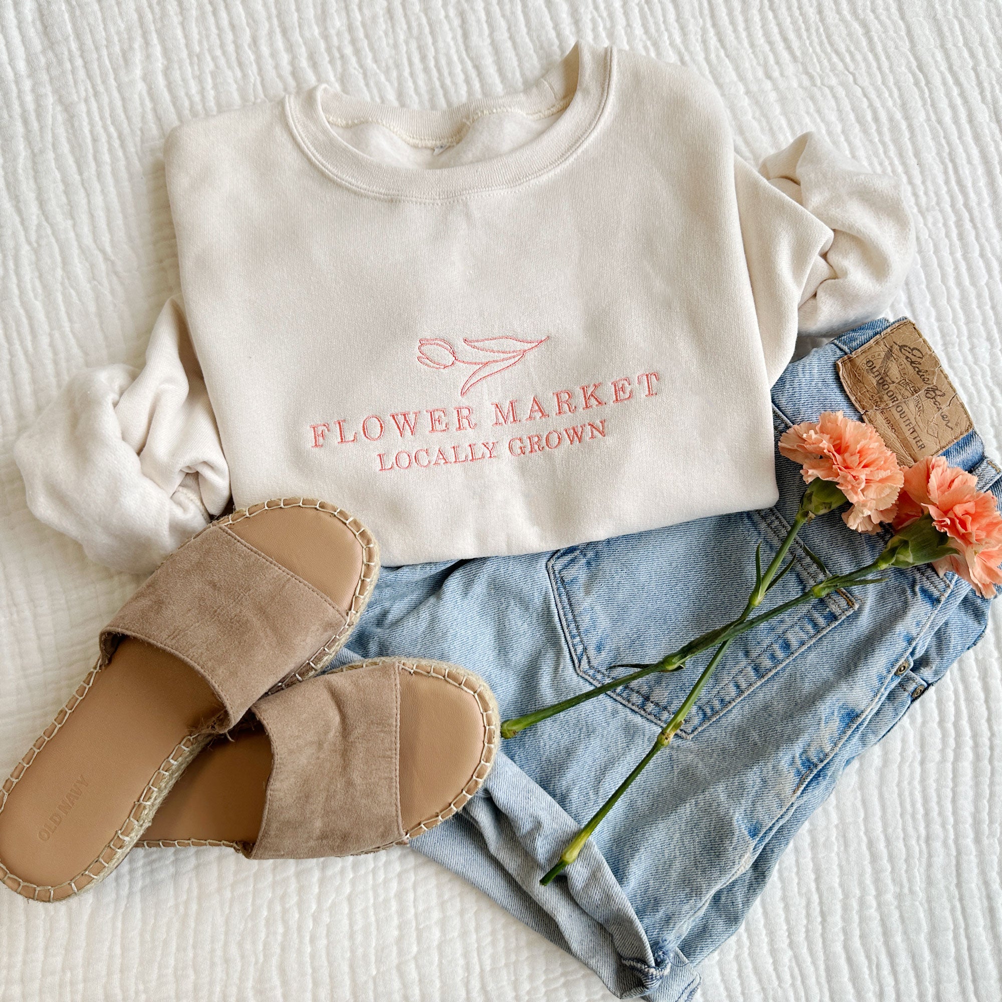 sweet cream crewneck with flower market locally grown embroidered in coral pink thread