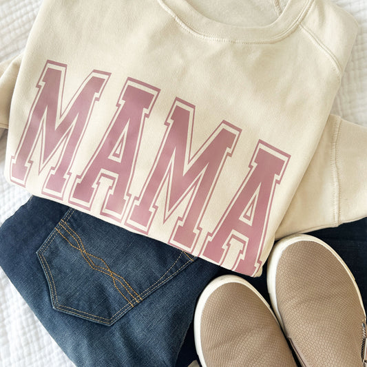 outfit featuring an oversized oyster shell crew with a varsity font mama print