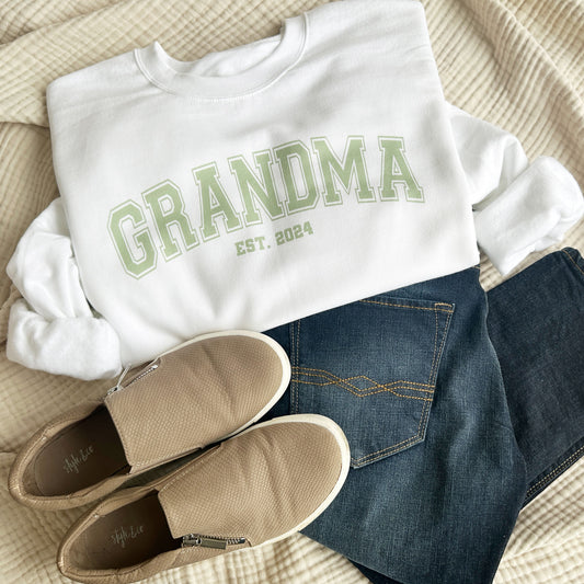 white crewneck sweatshirt with sage green grandma est custom print 