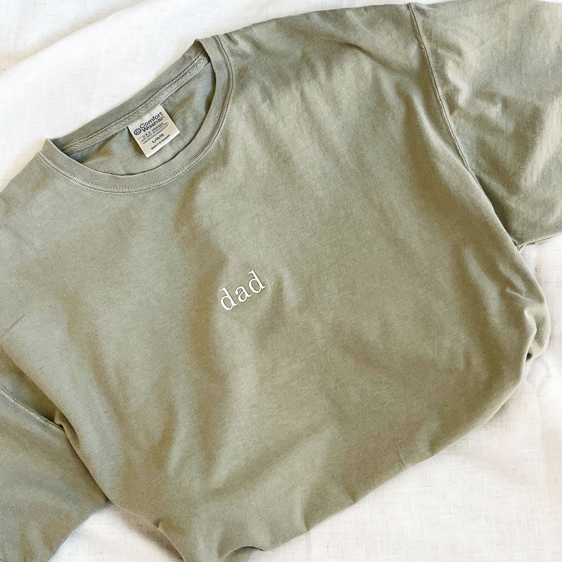 sandstone comfort colors crewneck t shirt with minimal custom embroidery reading dad on the center chest