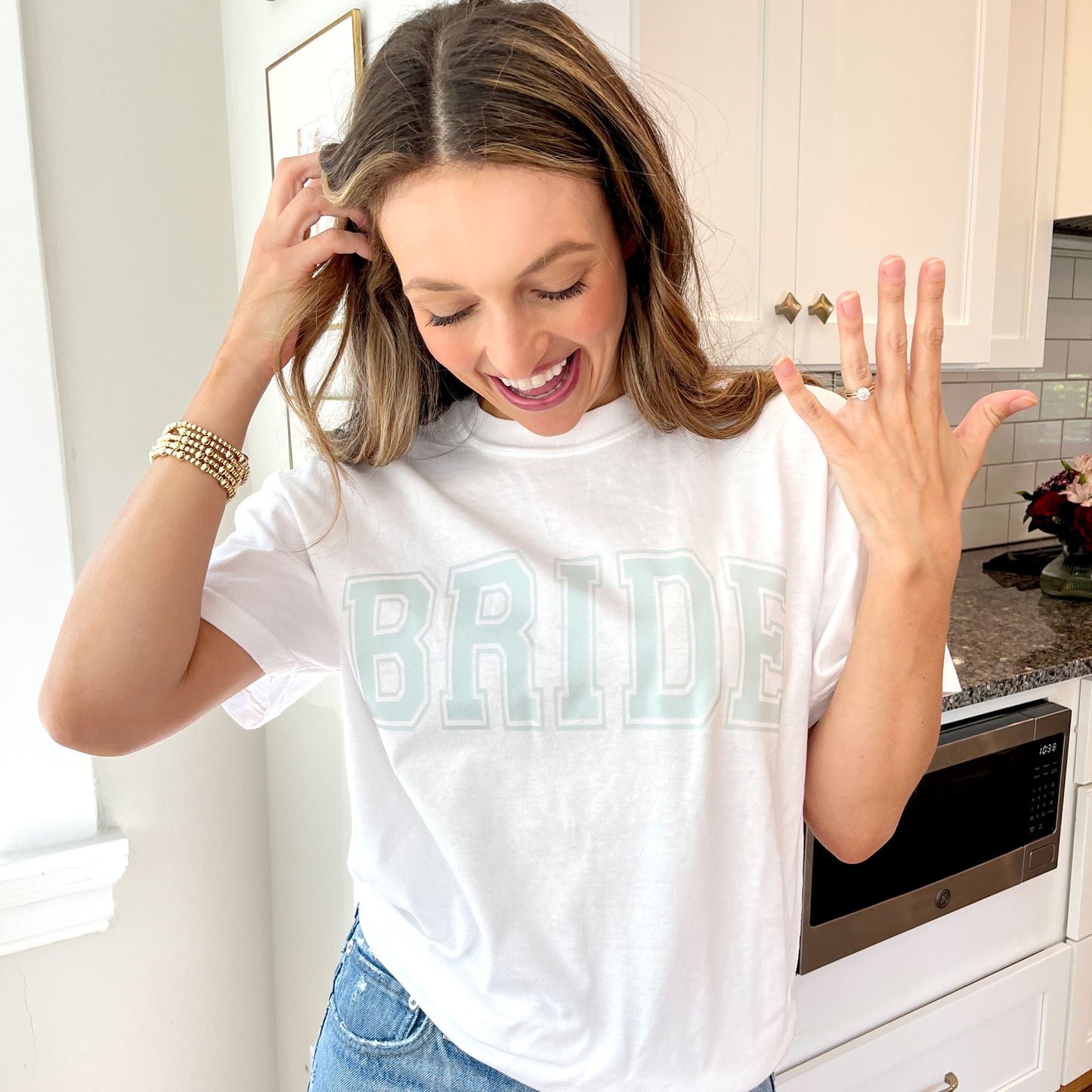 woman wearing white tee with bride dtf print 