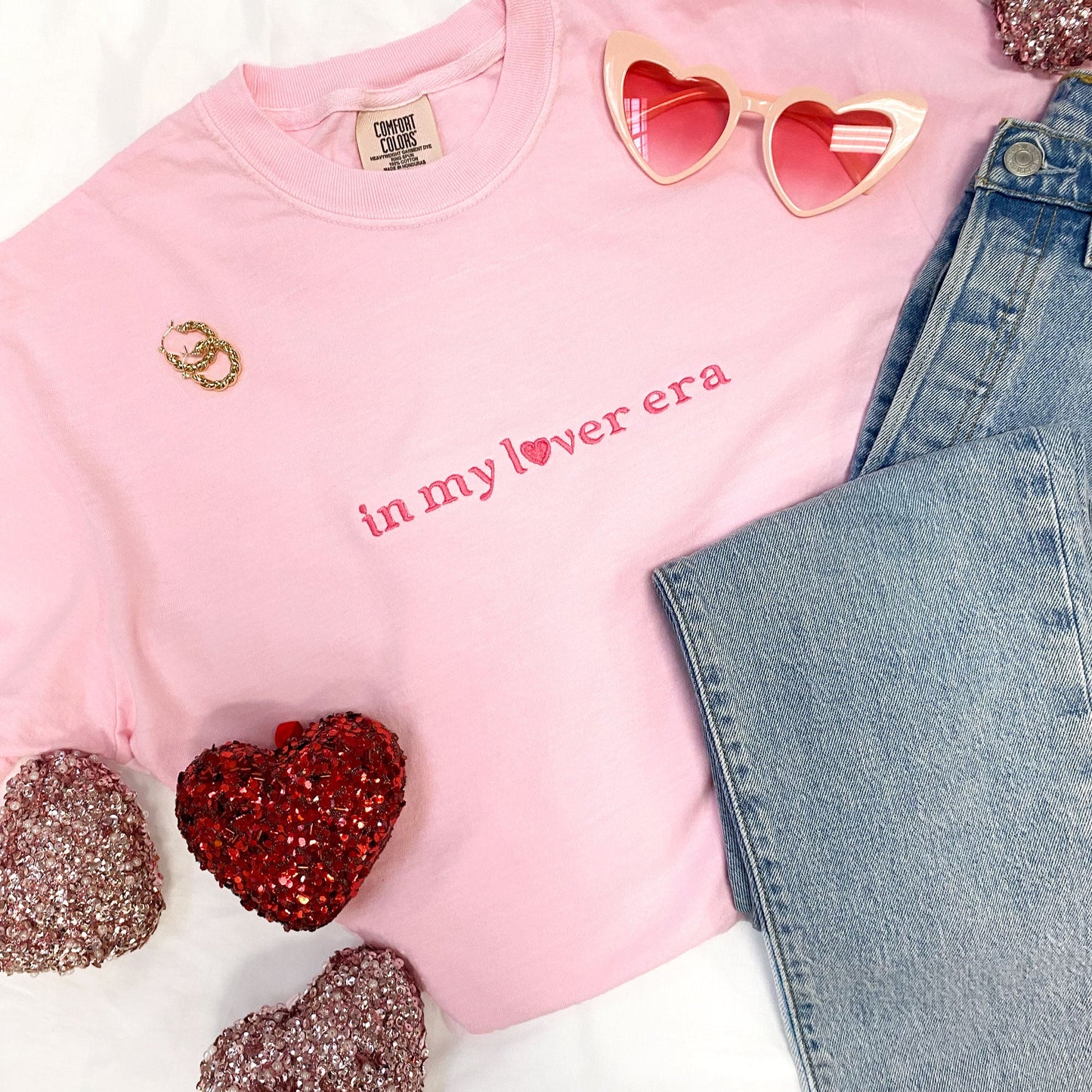 blossom pink t-shirt with in my lover era embroidered across the chest in a bright pink thread
