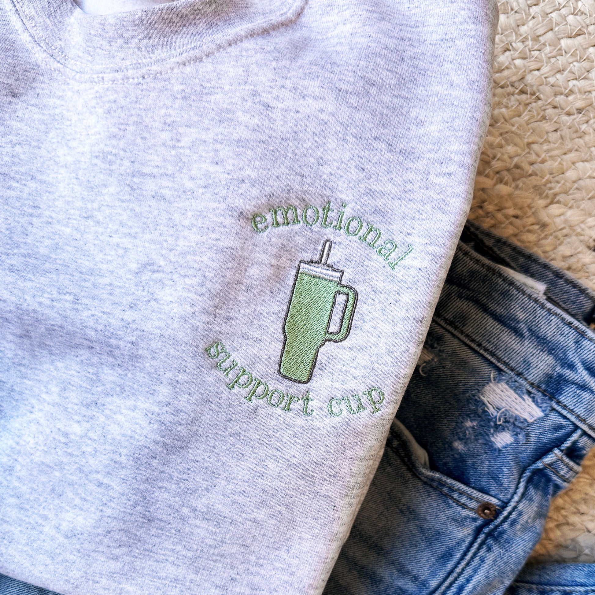 sweatshirt with an 'emotional support cup' and 40oz tumbler cup embroidered design