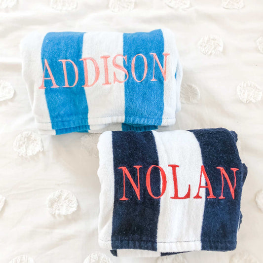 two beach towels with custom name embroidery