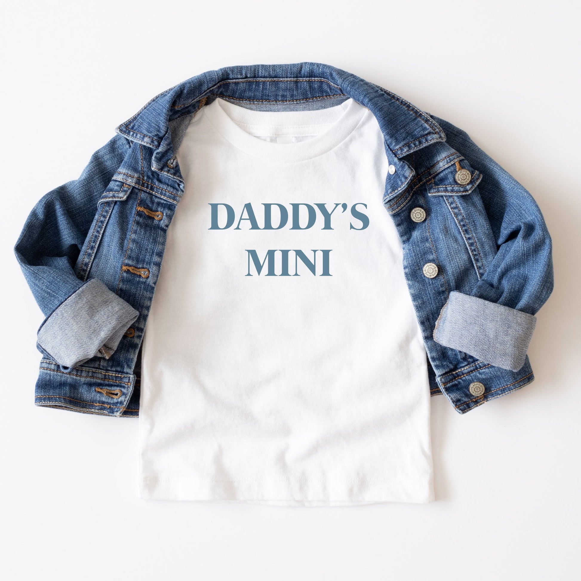 youth jean jacket and a white tee featuring a custom dtg printed design reading '"daddy's mini" across the chest 