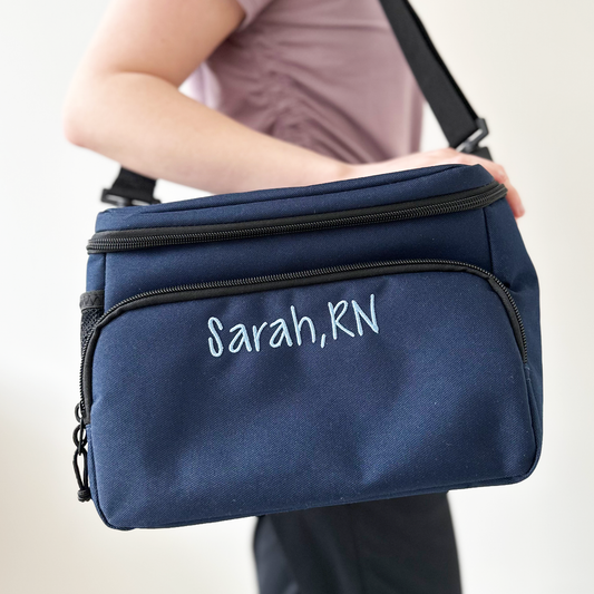 woman with lunch cooler hanging on shoulder with custom embroidered name