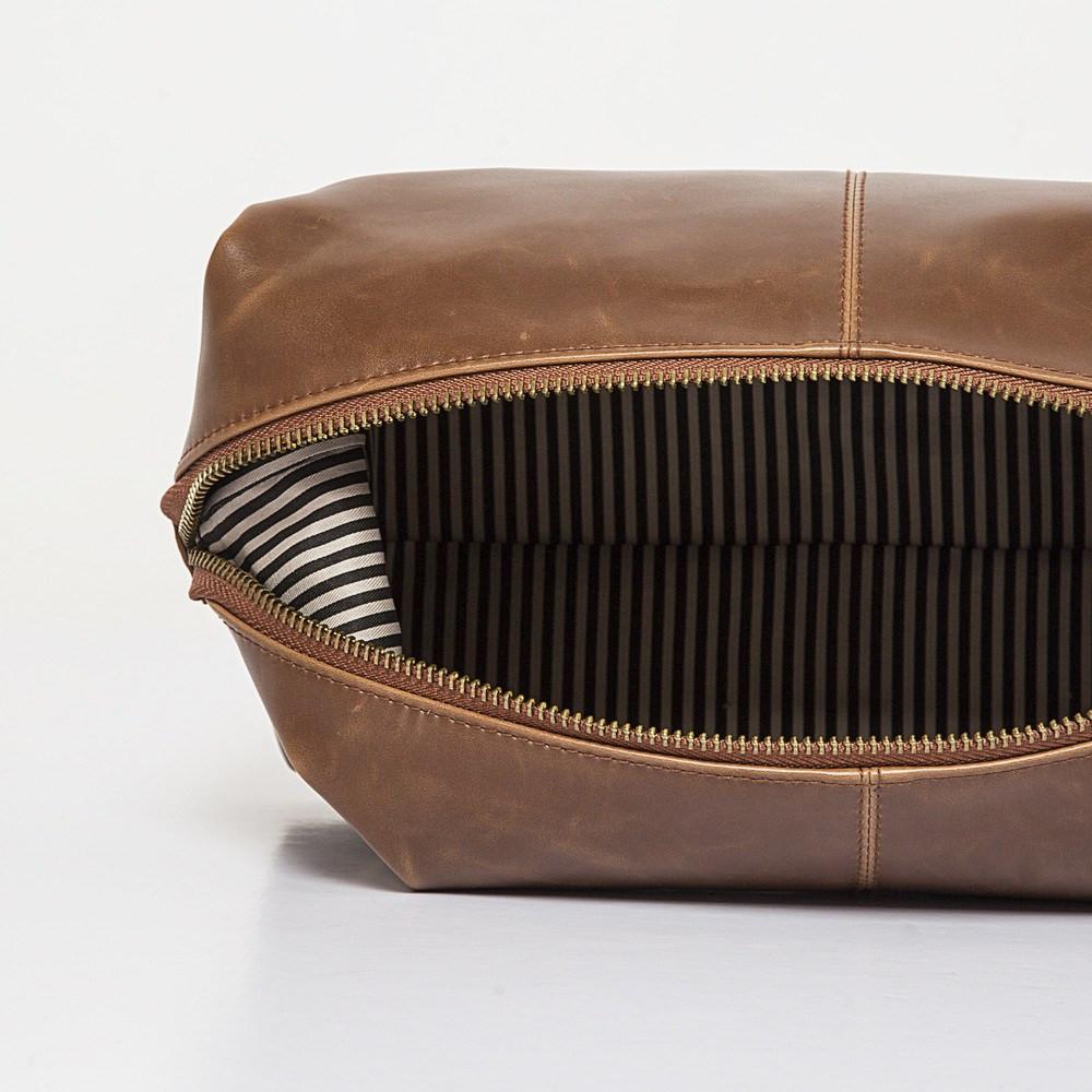 faux brown leather dopp kit interior view