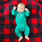 baby boy wearing a long legged baby rib bodysuit with custom 3-letter monogram