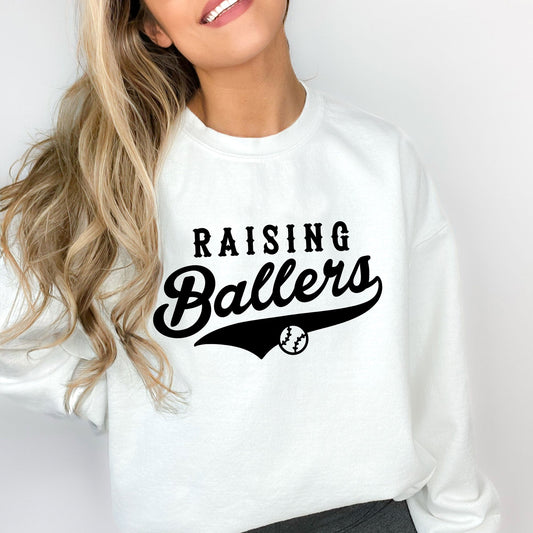 woman wearing an oversized white sweatshirt with a mixed sporty varsity font printed on the front