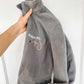 gray midweight fleece full zip jacket with a personalized name, credentials, and stethoscope embroidery design