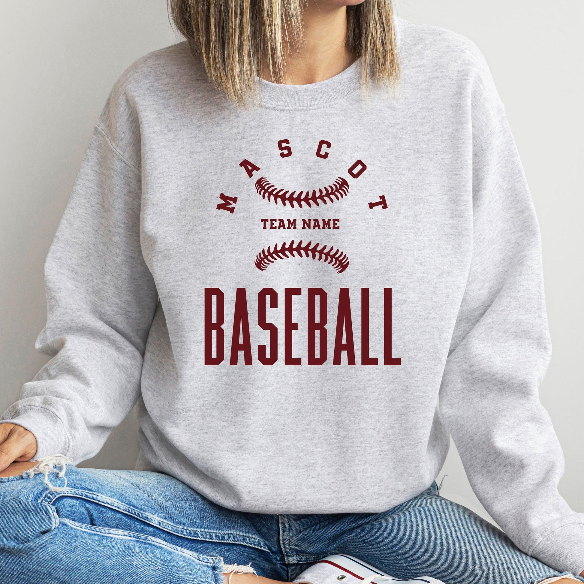 personalized ash sweatshirt featuring a custom design with a baseball, team mascot, and team name