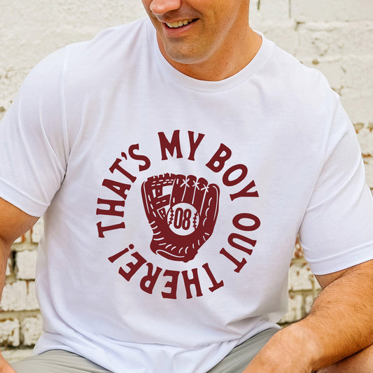 man wearing a t-shirt with a custom maroon print reading 'that's my boy out there!' with a baseball mitt in the center and a custom player number